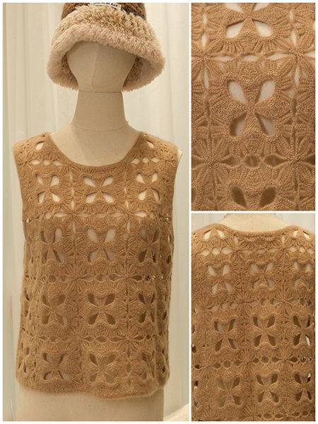 Macro shot of the hand-knitted cable pattern. Notice the subtle variations in tension and the organic flow of the stitches, which are the authentic signatures of artisanal craftsmanship, impossible to replicate by machine.Close-up detail of a hand-finished placket and buttonhole. The precision of the hand-stitching underscores the meticulous attention given to every component of the garment, ensuring durability and a flawless custom look.