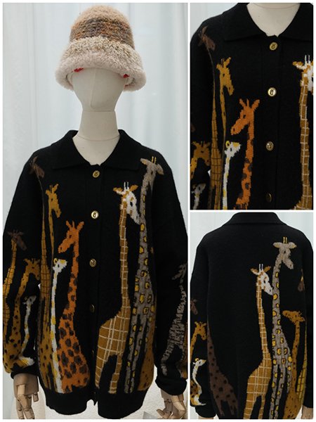 Detail focus on an appliqué embroidery technique, where felted wool shapes are meticulously hand-stitched onto the knit sweater. This method adds a bold, graphic quality and a unique three-dimensional depth.