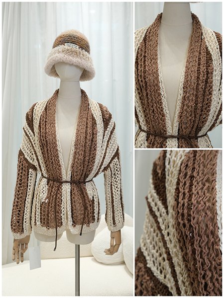 A one-of-a-kind hand-loomed sweater, showcasing the rich texture and depth that only traditional hand-knitting techniques can achieve. The piece carries the soul and skill of the maker in every loop.Macro shot of the hand-knitted cable pattern. Notice the subtle variations in tension and the organic flow of the stitches, which are the authentic signatures of artisanal craftsmanship, impossible to replicate by machine.