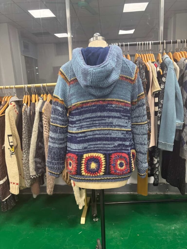 Back view of chunky knits hoodie with sequin embroidery