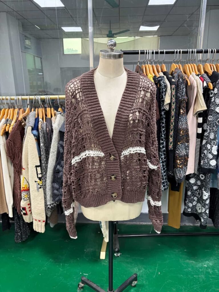 Brown custom crochet cardigan with white trim