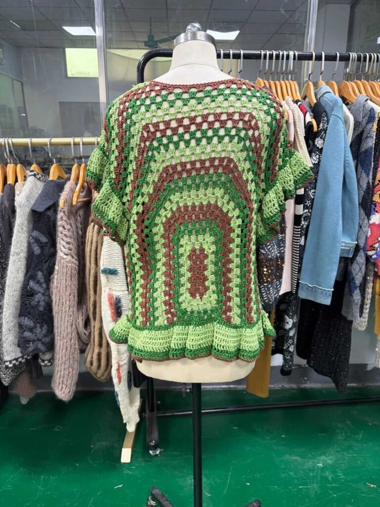 Back view of handmade green and brown granny square crochet top