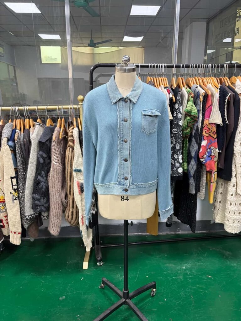 Artisanal knitwear craftsmanship blending automated technology with hand-finishing for bespoke knitwear brands