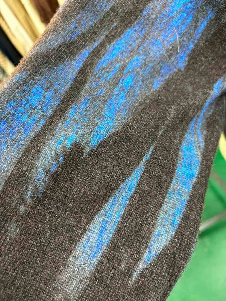 Sleeve detail of knits embroidery and sequin yarn