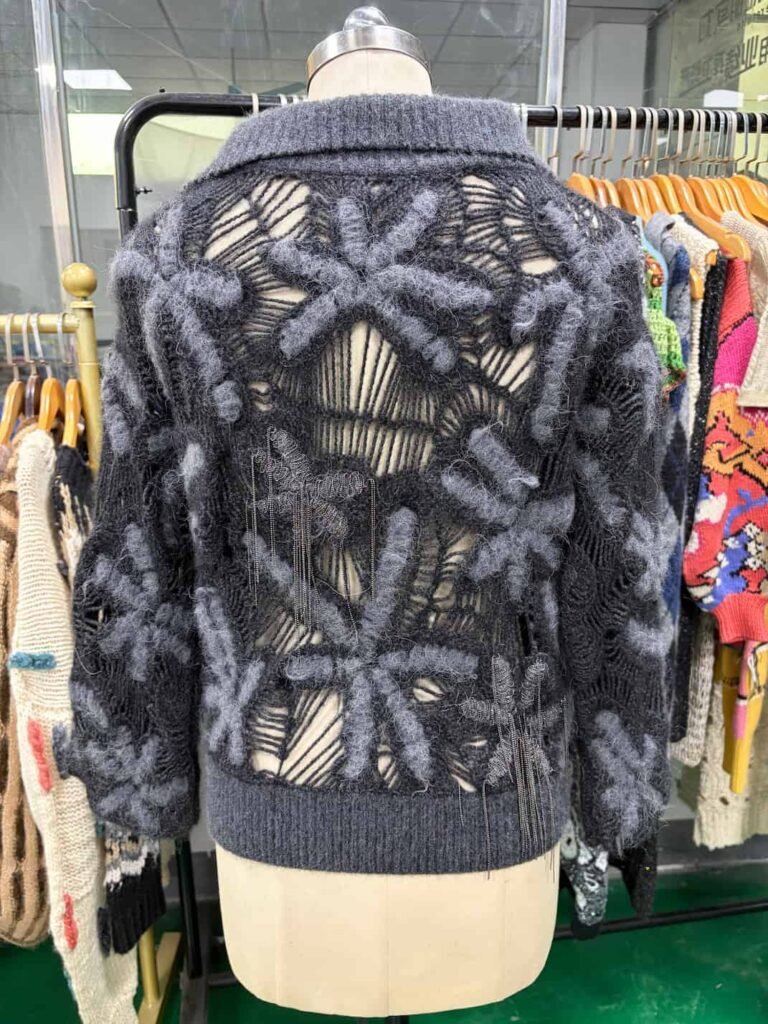 Back view of artistic luxury cashmere knit sweater